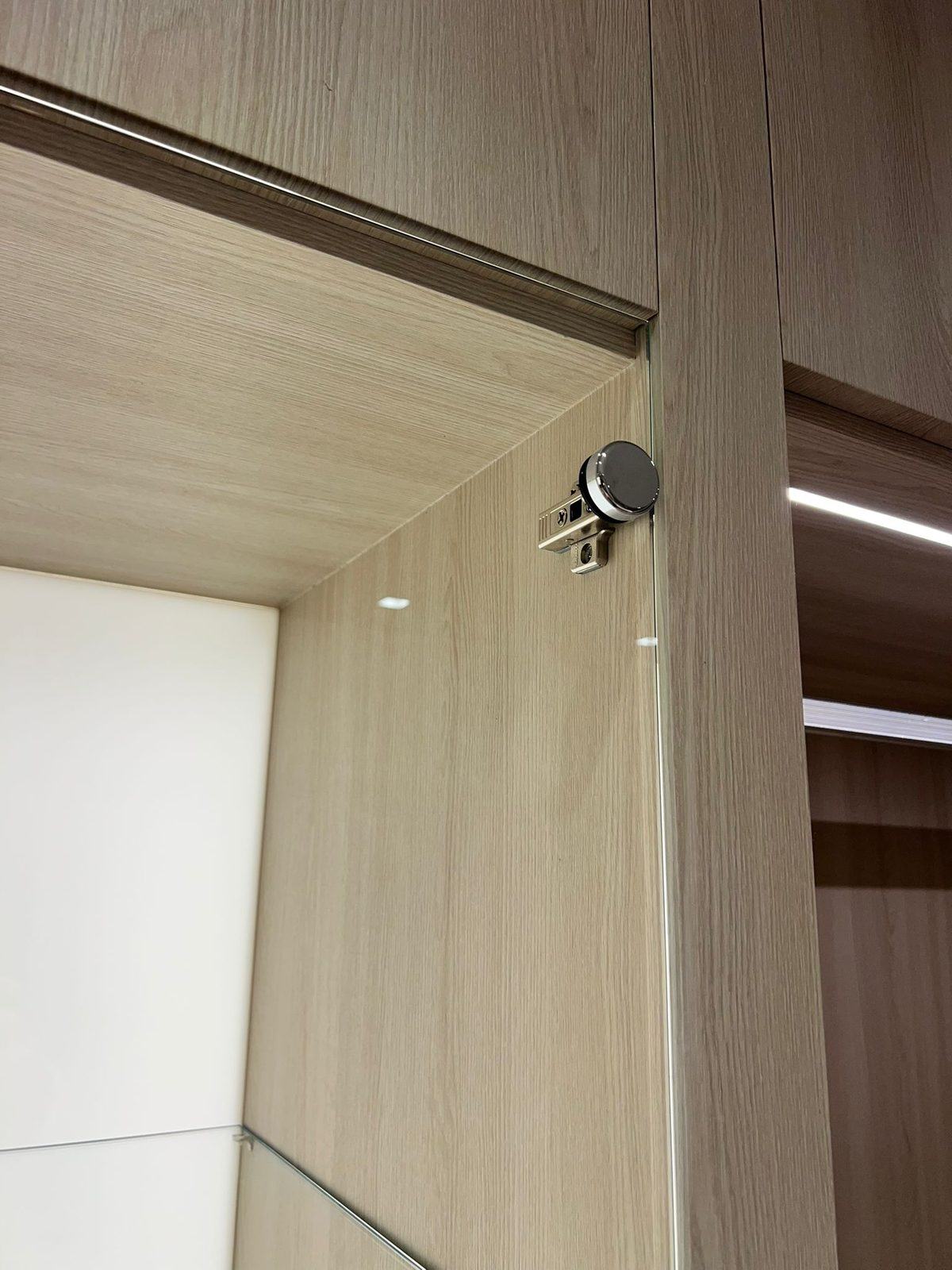 Wardrobe detail in light wood-look film