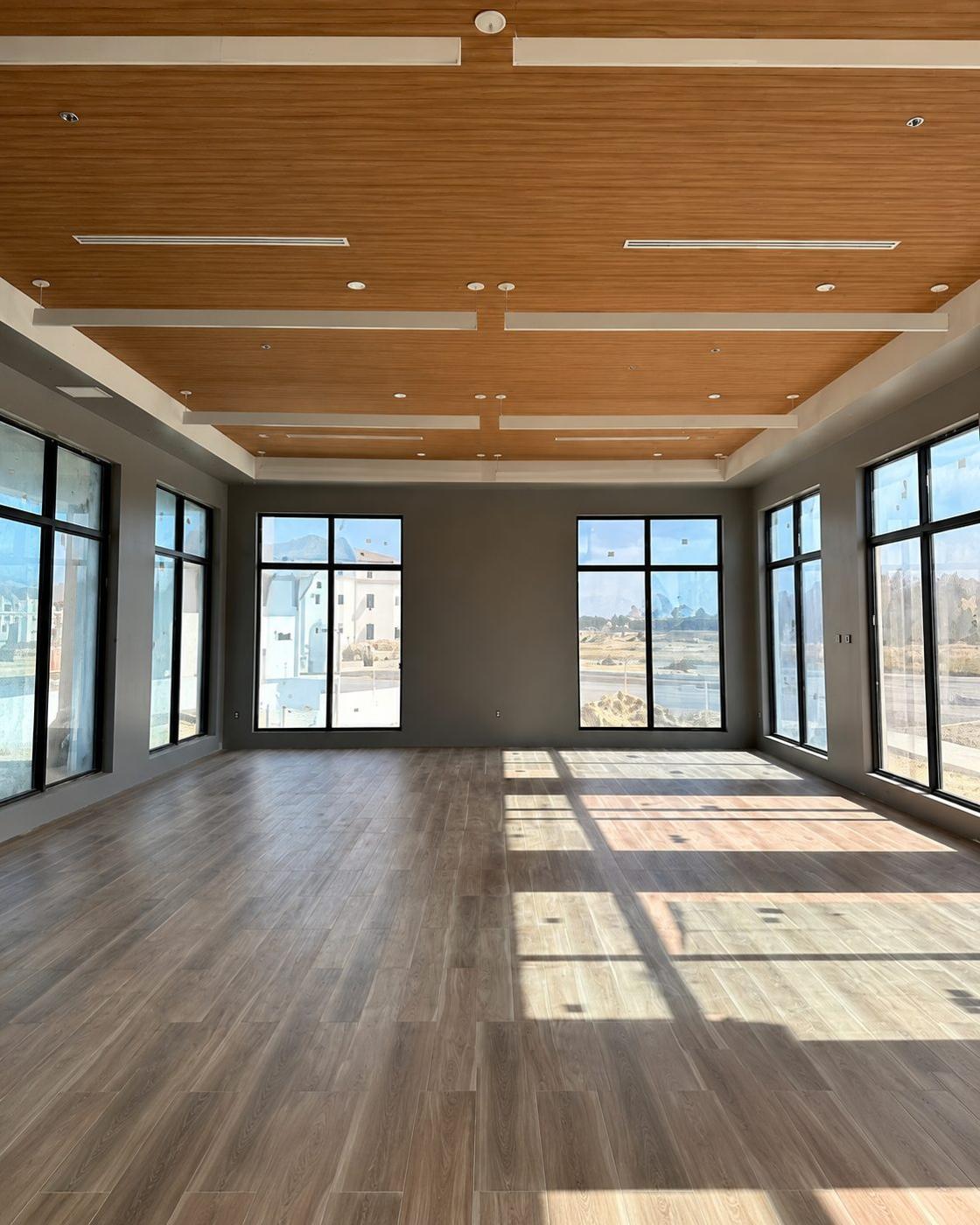 After: clubhouse ceiling with wood-look beams