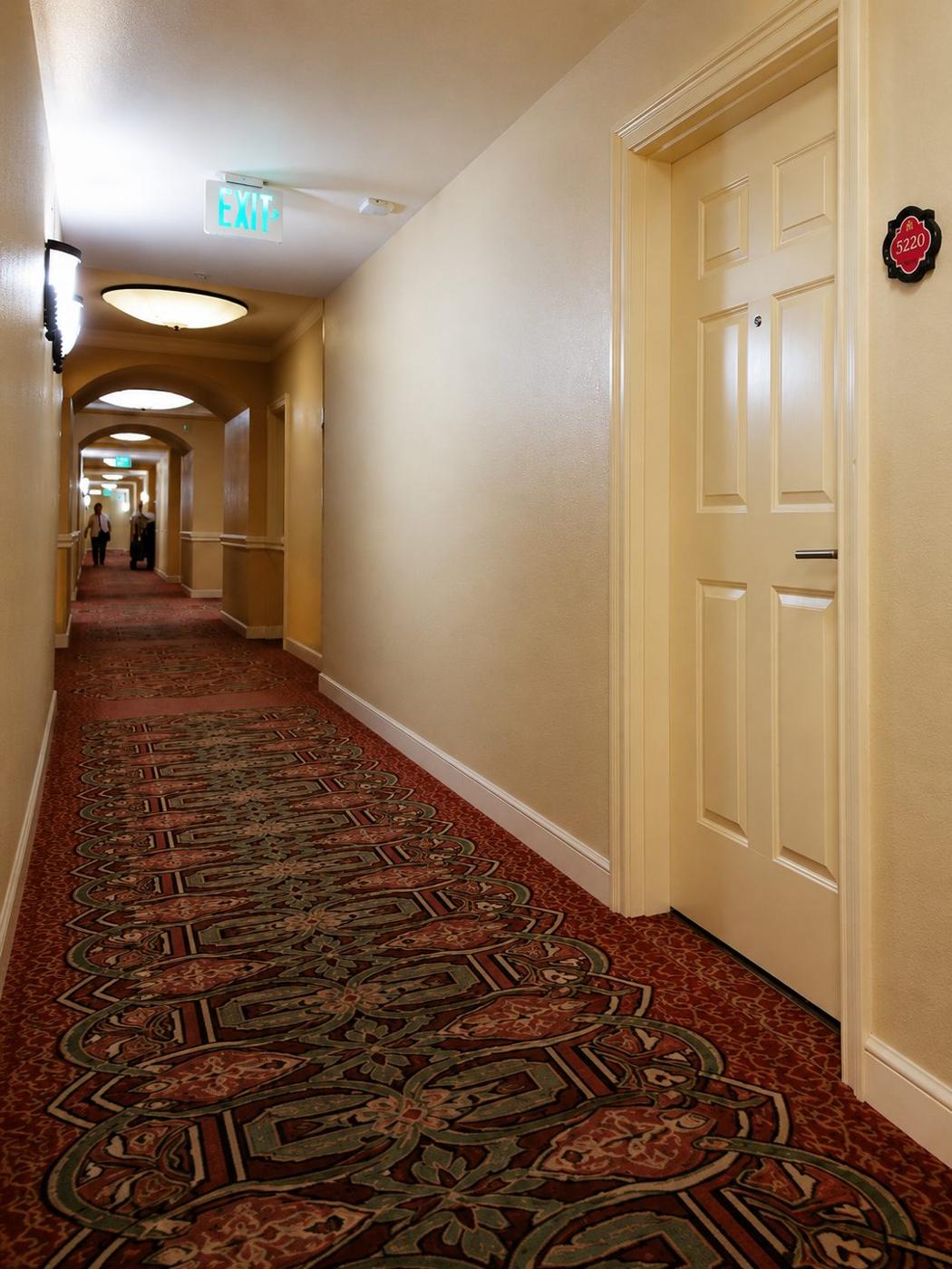 Hotel corridor with old raised-panel doors